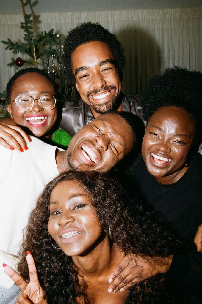 group of friends smiling together group of friends smiling together